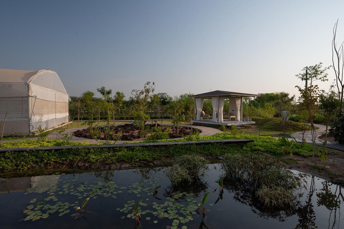 Veranda sitting with view of lake and greenery